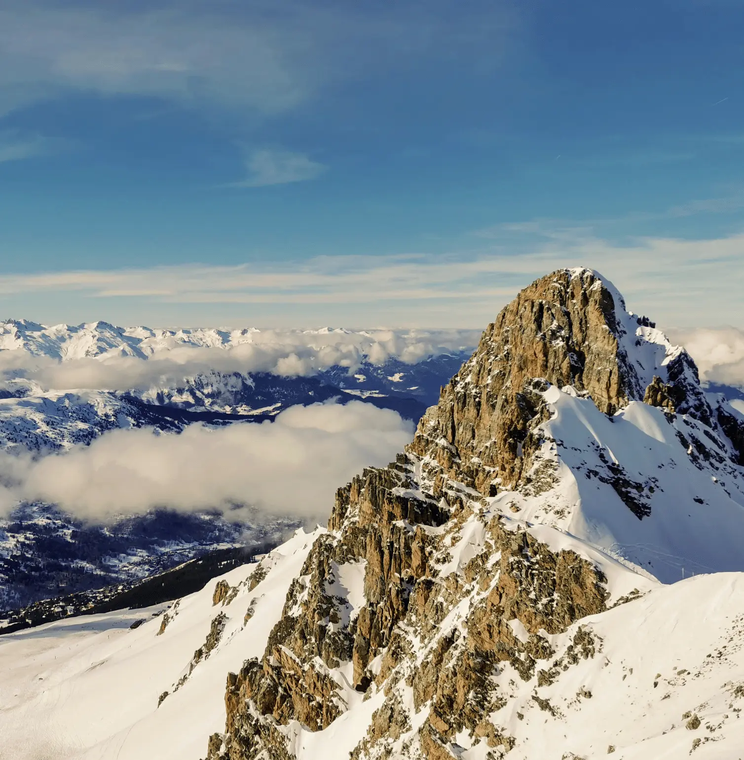 Snowy mountains in Courchevel during sunset in the French Alps