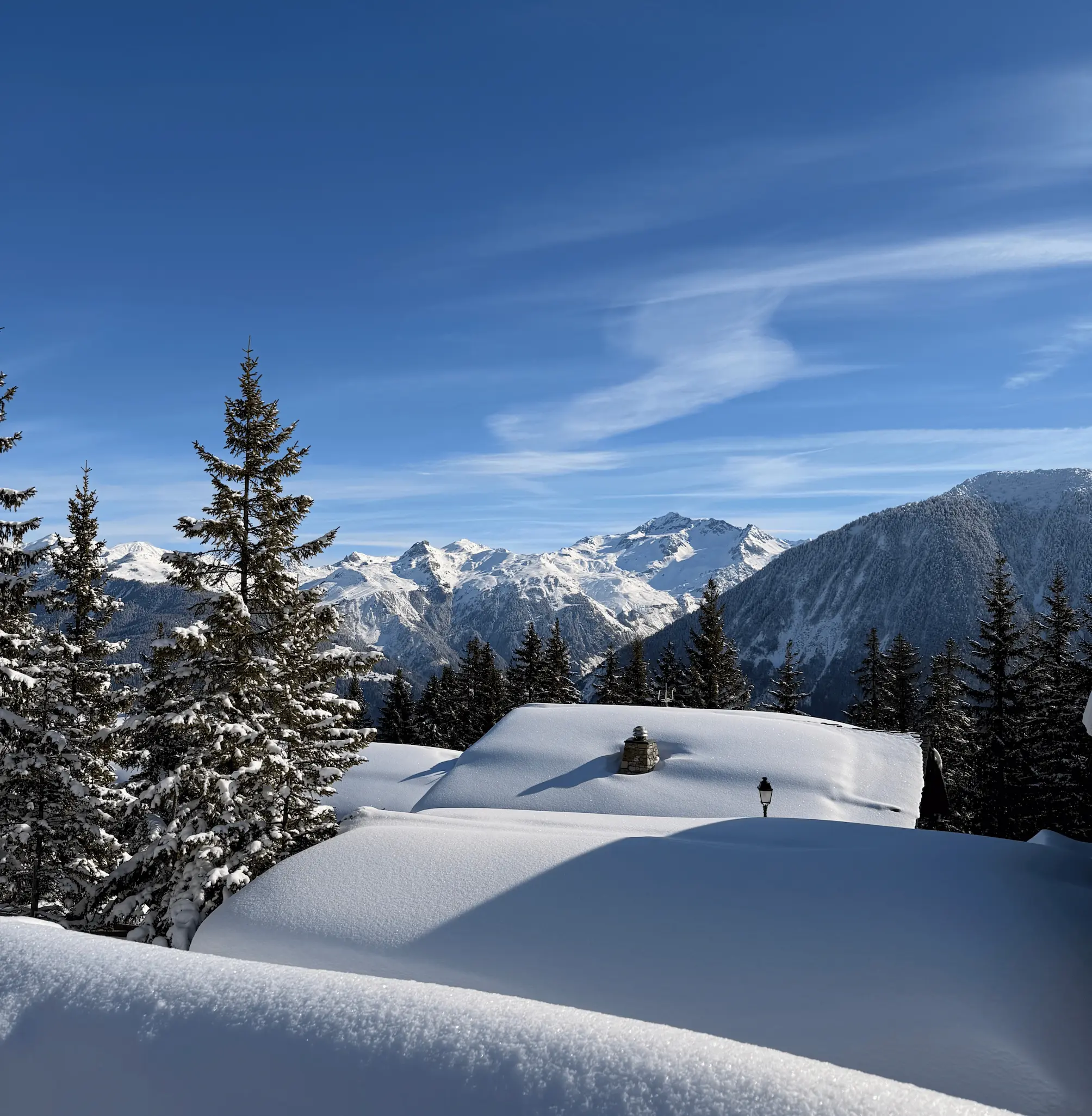 Snow-covered rooftops in Courchevel village
