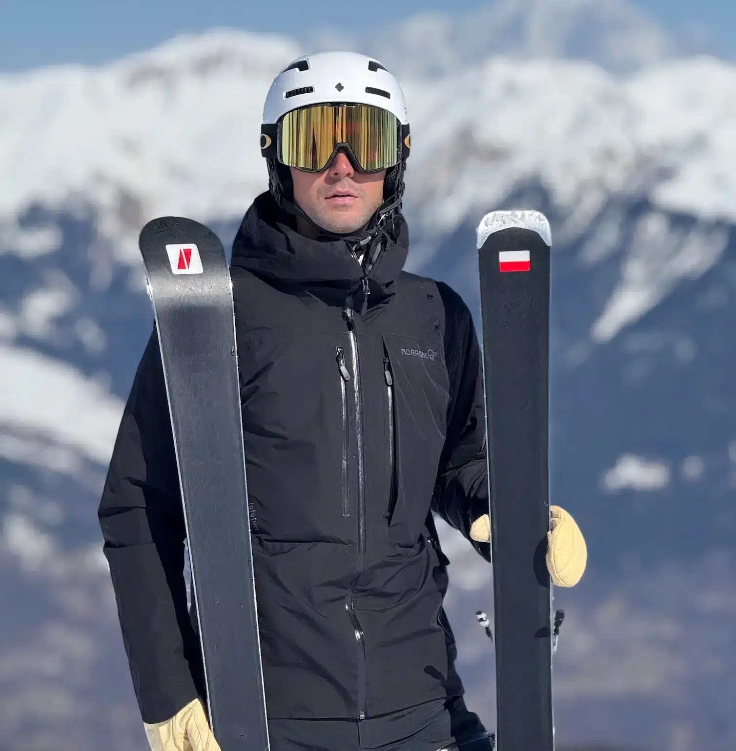 Private ski instructor Ludovico ROSA holding skis