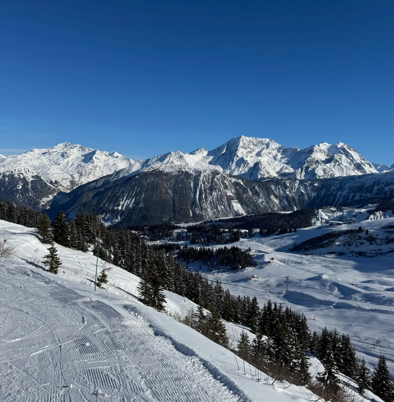Snowy mountain with ski slope in the Alps