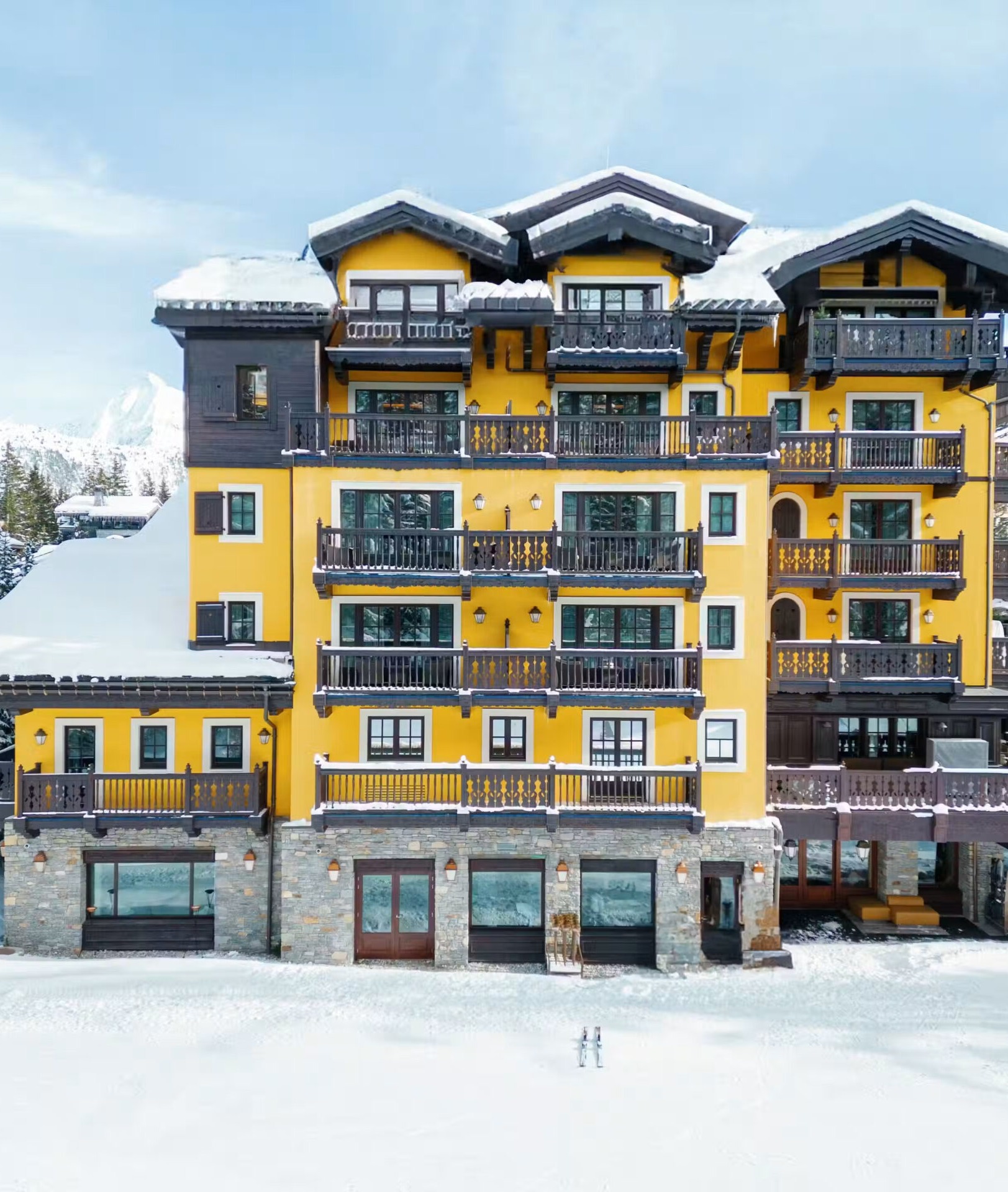Aerial drone view of Cheval Blanc hotel exterior in Courchevel