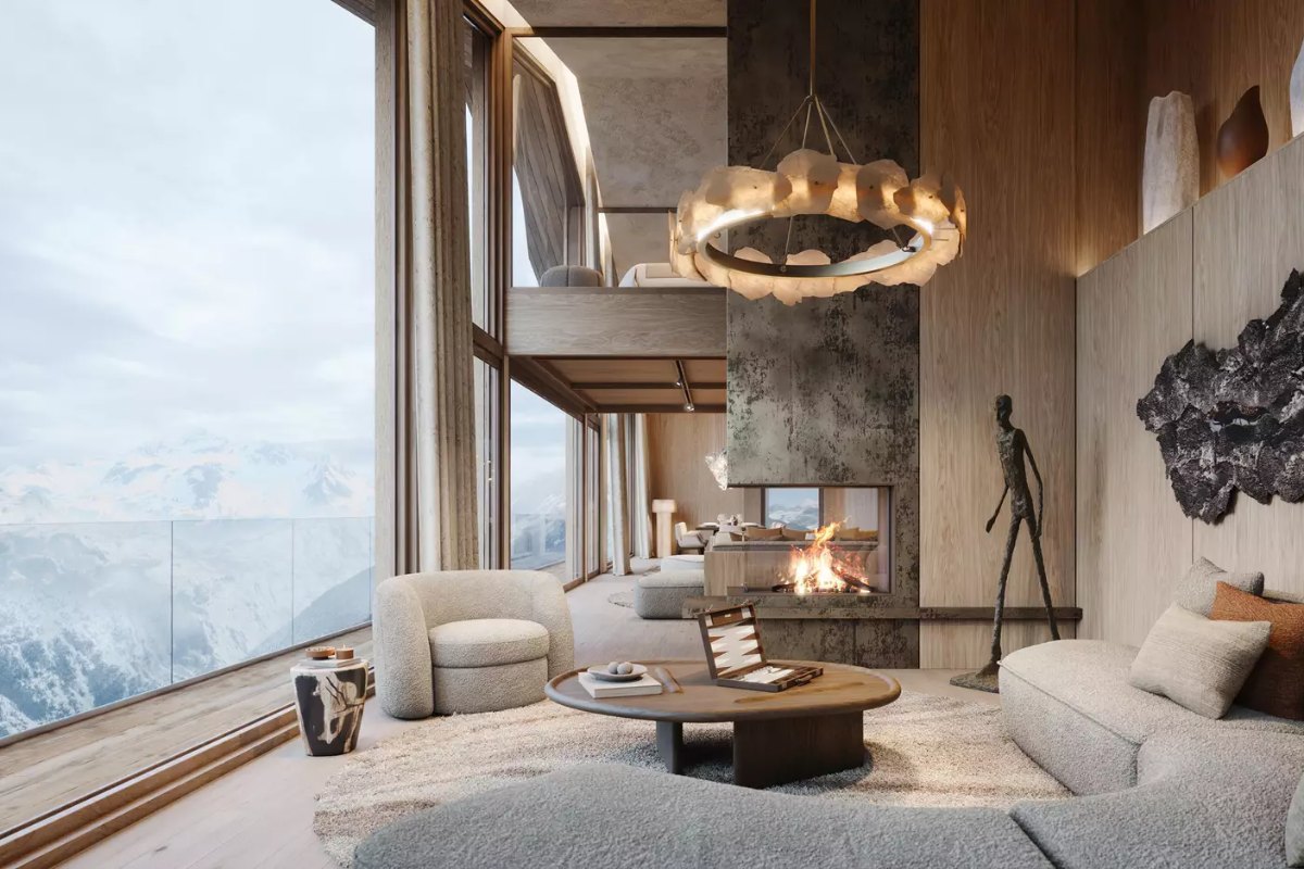 Lounge with floor-to-ceiling windows over the valley