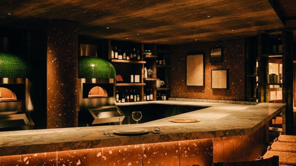 Marble counter with green-tiled pizza ovens at Simonetta, Bourbon Hotel, Courchevel 1850